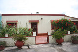 Venta Casa en Rocha.Tres Dormitorios, Cocina Comedor, Living y un baño. Garaje y galpón.